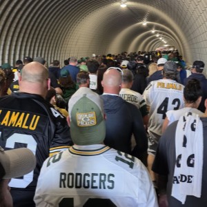 Steelers and Jets fans walking through the MetLife Stadium tunnel